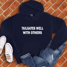 Load image into Gallery viewer, Tailgates Well With Others Hoodie