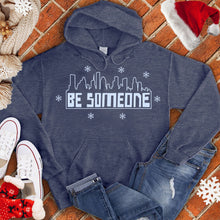Load image into Gallery viewer, Be Someone Snow Mural Hoodie
