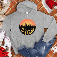 Load image into Gallery viewer, H-Town Round Sunset Christmas Hoodie
